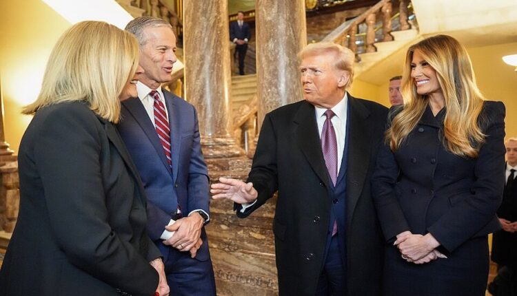 President donald trump and melania trump with senator john thune.jpg
