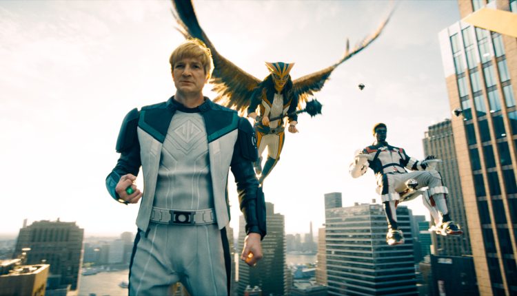 Superman from l r nathan fillion as guy gardner isabela merced as hawkgirl and edi gathegi as mr. te.jpeg