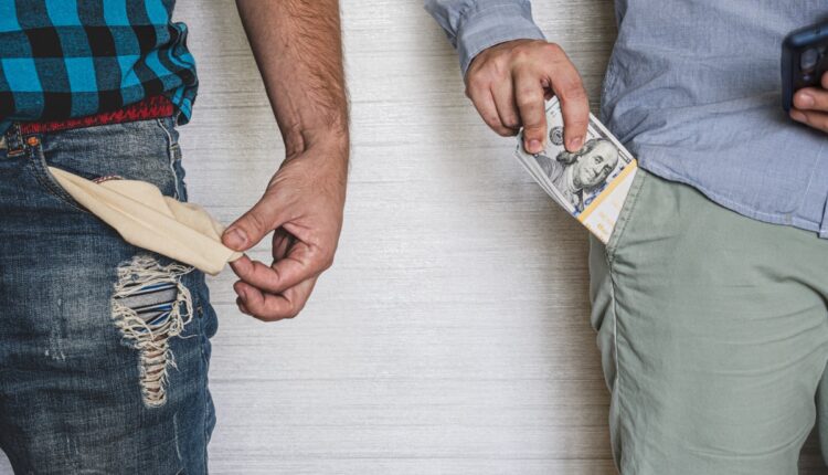 Inequality men with without money 09.27.25 getty 1351635085.jpg