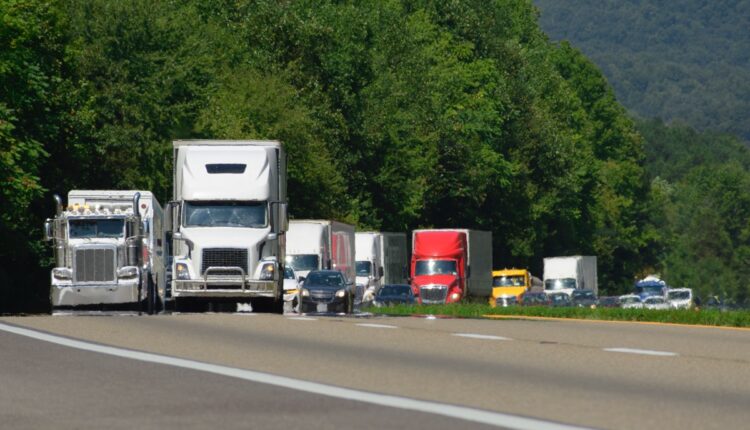 Trucks on highway with trees 10.30.25 getty 2170862019.jpg