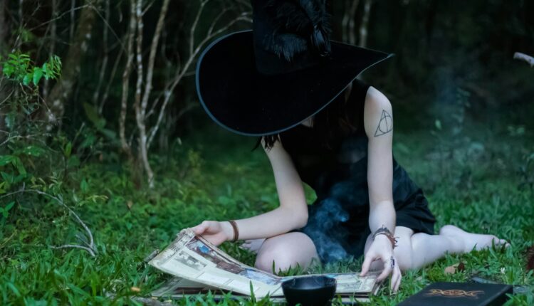 Woman reading book on lawn.jpg