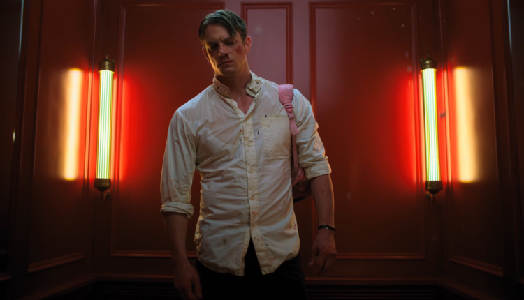 Joel kinnaman in altered carbon standing in an elevator.png