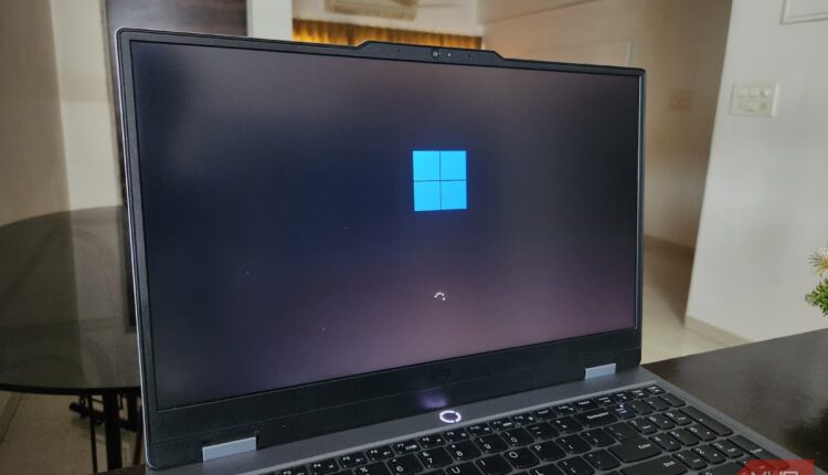 Lenovo laptop showing windows 11 startup screen.jpg