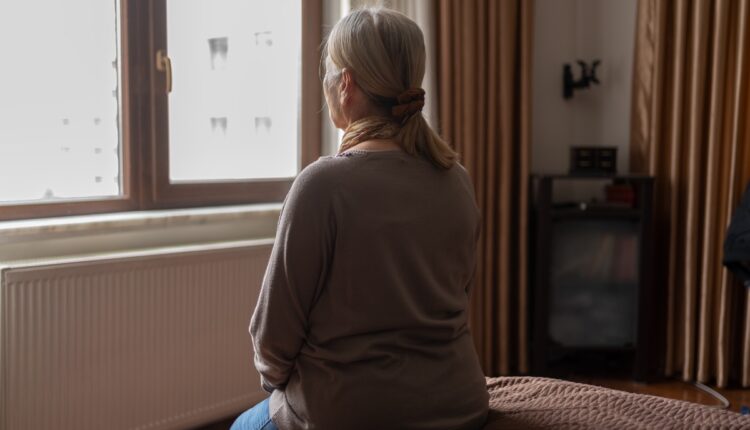 Older woman back to window Alzheimers 12.23.25 Getty 1434959162.jpg