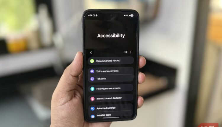 Accessibility menu on android phone in hand.jpg