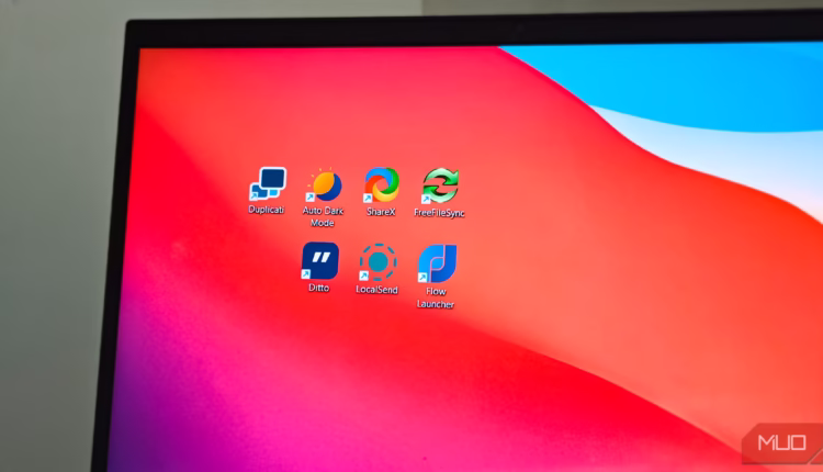 Open source apps like ditto freefilesync flow launcher sharex auto dark mode duplicati on windows 11.avif