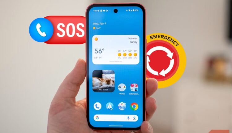 Google pixel 9a in hand with emergency and sos stickers.jpg