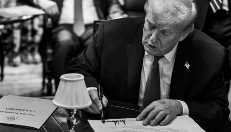 Paradigm trump signing document 1200x630.jpg