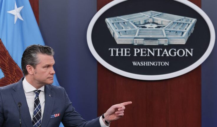 Secretary of war hegseth and joint chiefs chairman general caine hold 1 scaled e1773957853147.jpg