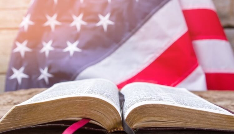 Bible and flag resized 09.09.25 04.18.24 Getty 544685718.jpg