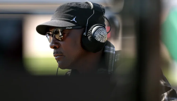 GettyImages 2271954901 Denny Hamlin Reacts to Michael Jordans Viral ChokeKiss Moment After NASCAR Ra.webp