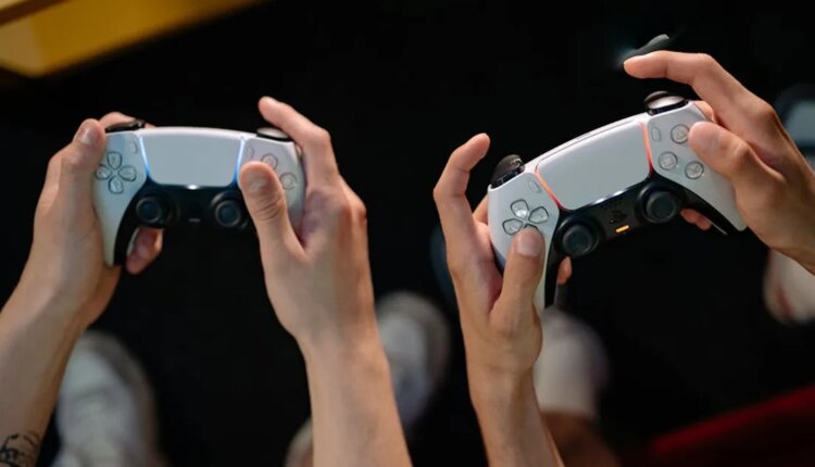 Sony DualSense controllers PS5 gaming together multiplayer.jpg