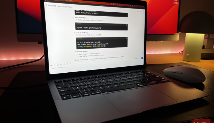 A macbook air running deepseek r1 locally with a monitor in the background.png
