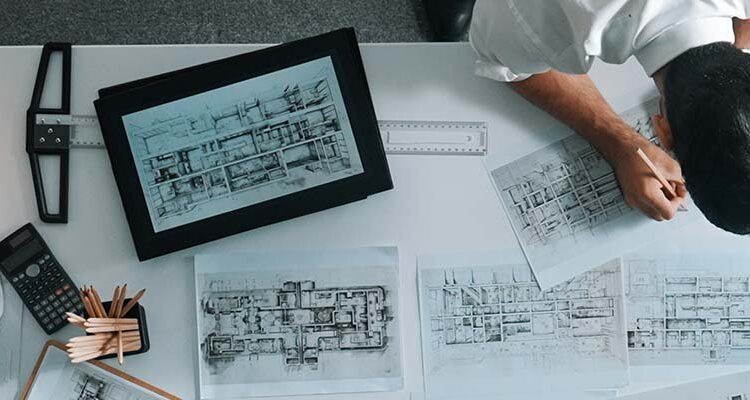 Architect building design blueprint NanoStockk getty RF hero.jpg