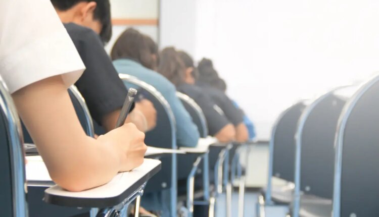 Hands university student holding pen 129521477 d065a8.jpg