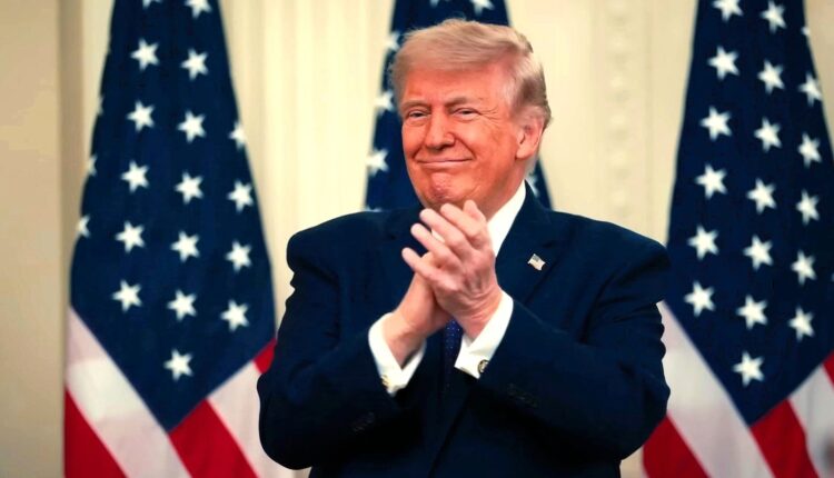 009 trump clap flags smile confident happy smiling.jpg