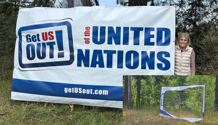Get US Out vandalized banner 2 07.7.26 CC Watchdog.jpg