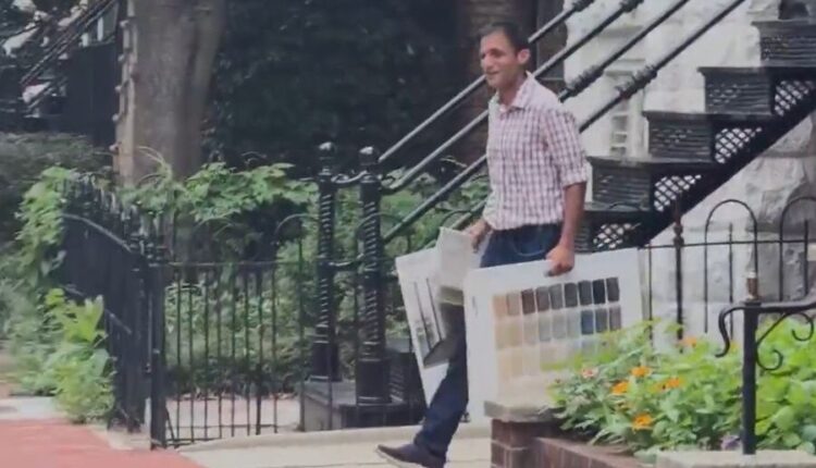 Man outside Mitch McConnell home 900x600.jpg