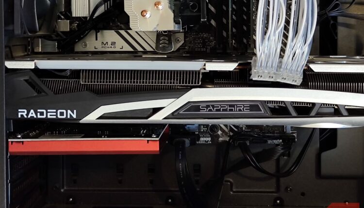 Inside of a pc case showing a graphics card and an audio card.jpg