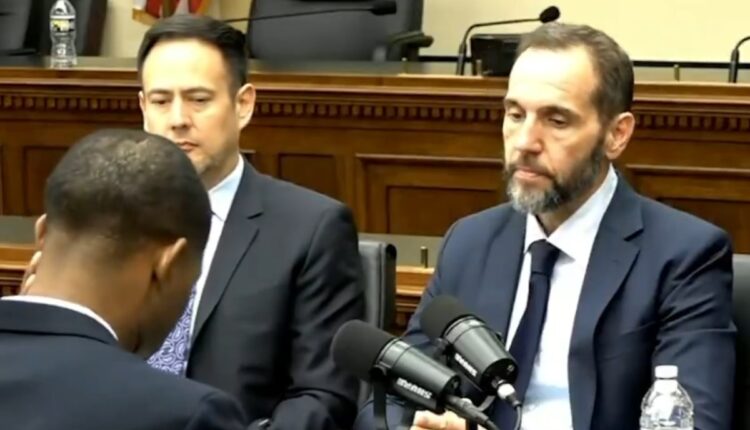 Smith testifies.jpg