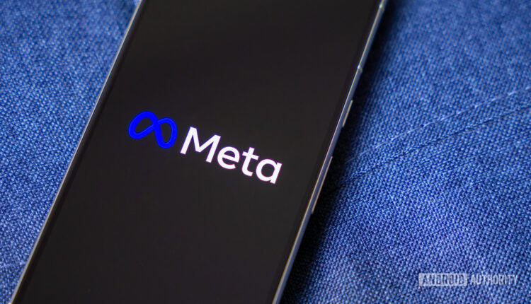 Meta logo on smartphone stock photo 4.jpg